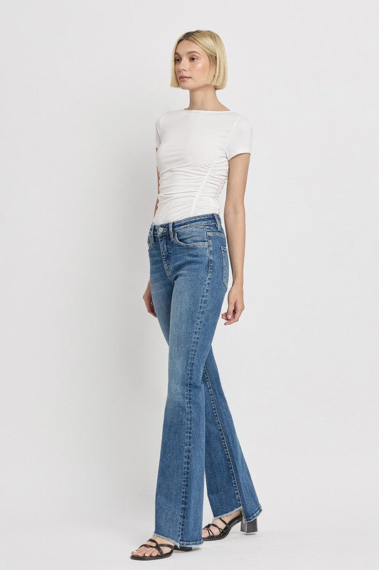 High Rise Slant Hem Flare Jeans (Online Only/Ships from USA)