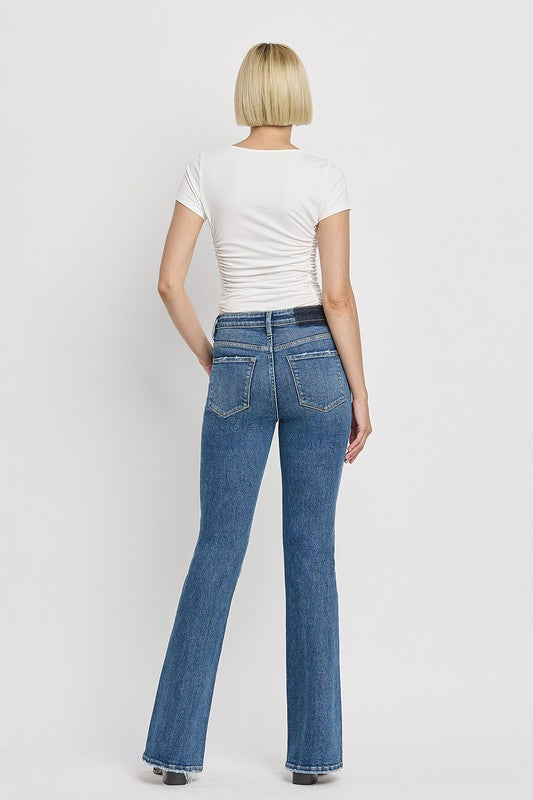 High Rise Slant Hem Flare Jeans (Online Only/Ships from USA)