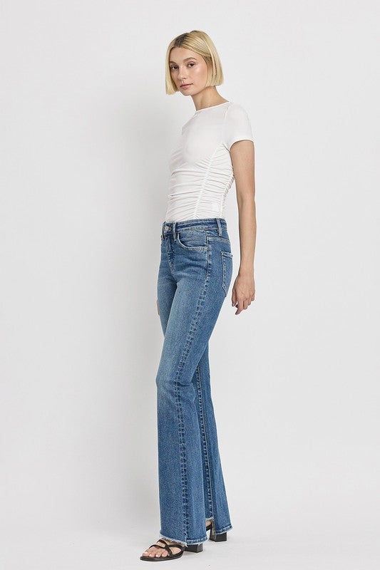 High Rise Slant Hem Flare Jeans (Online Only/Ships from USA)