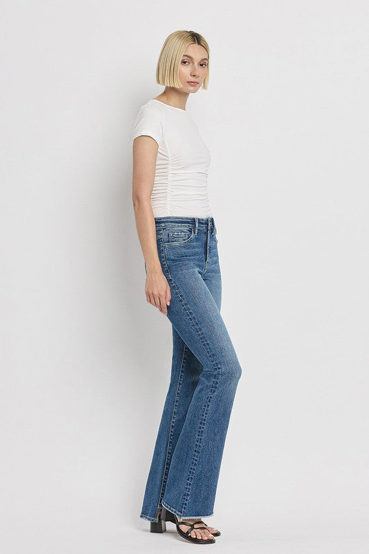 High Rise Slant Hem Flare Jeans (Online Only/Ships from USA)