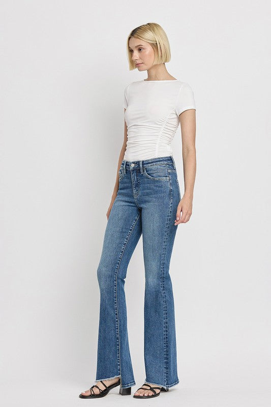 High Rise Slant Hem Flare Jeans (Online Only/Ships from USA)